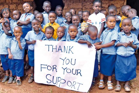 Seit 20 Jahren unterstützt die Kindernothilfe Kinder in Not. Im Bild Kinder in Ruanda, die durch ein Kindernothilfe-Projekt unterstützt werden. Foto: Kindernothilfe